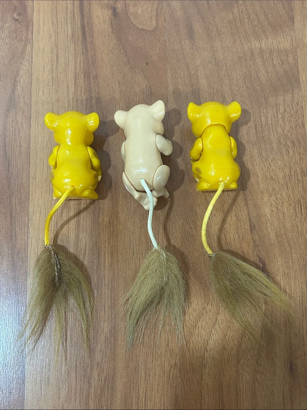 Mattel Yellow & Beige Plush-Tail Animal Pull Toys